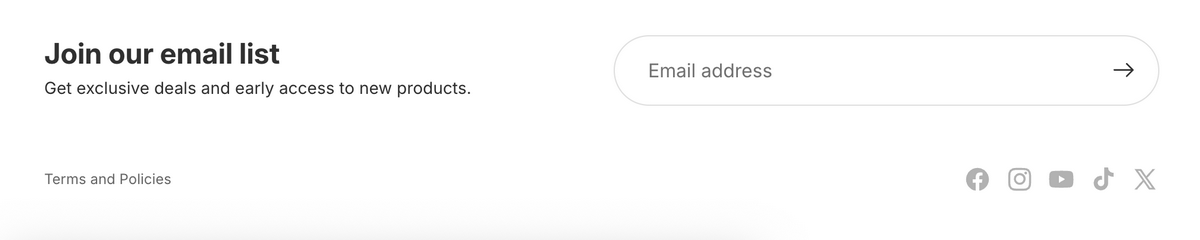 Shopify footer example without the "Powered by Shopify" text