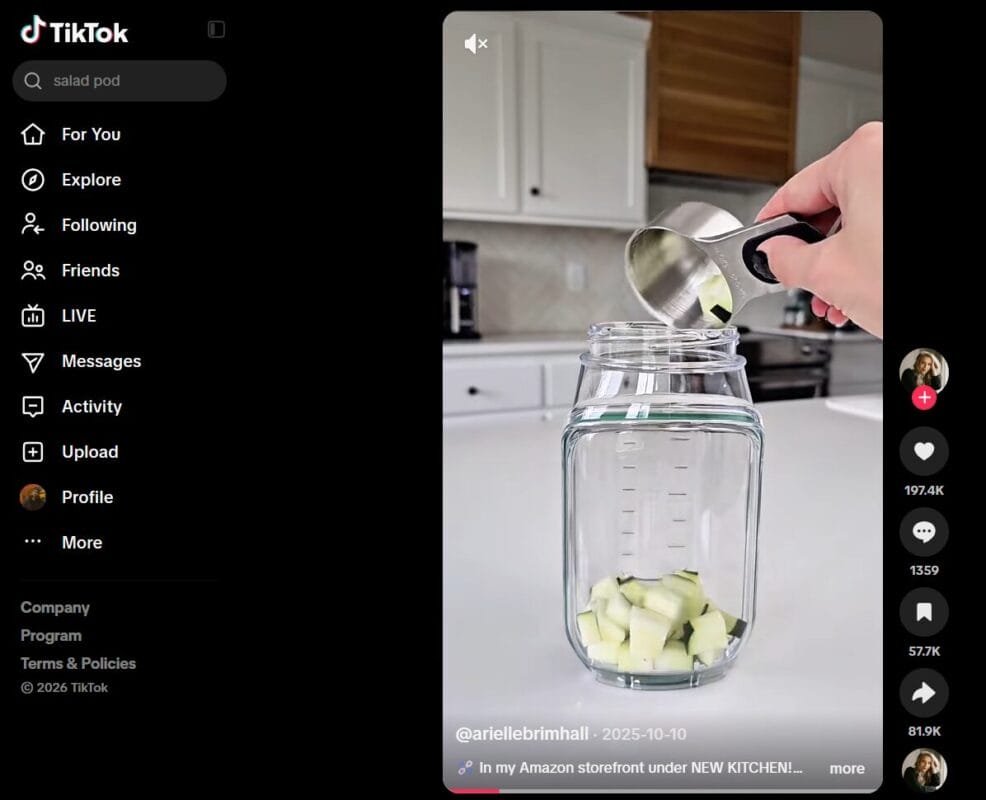 portable salad jar being packed with fresh ingredients